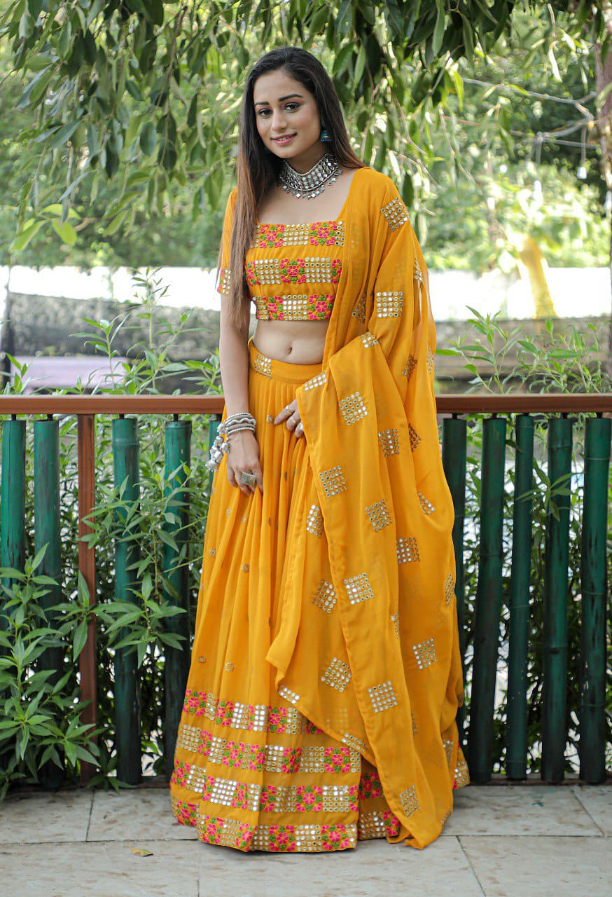 Mustered Embroidered Faux Georgette Party Wear Lehenga Choli