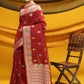 Red Meena woven Border And Zari Woven Pallu With Fancy Tassels