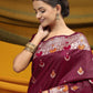 Wine Meena woven Border And Zari Woven Pallu With Fancy Tassels