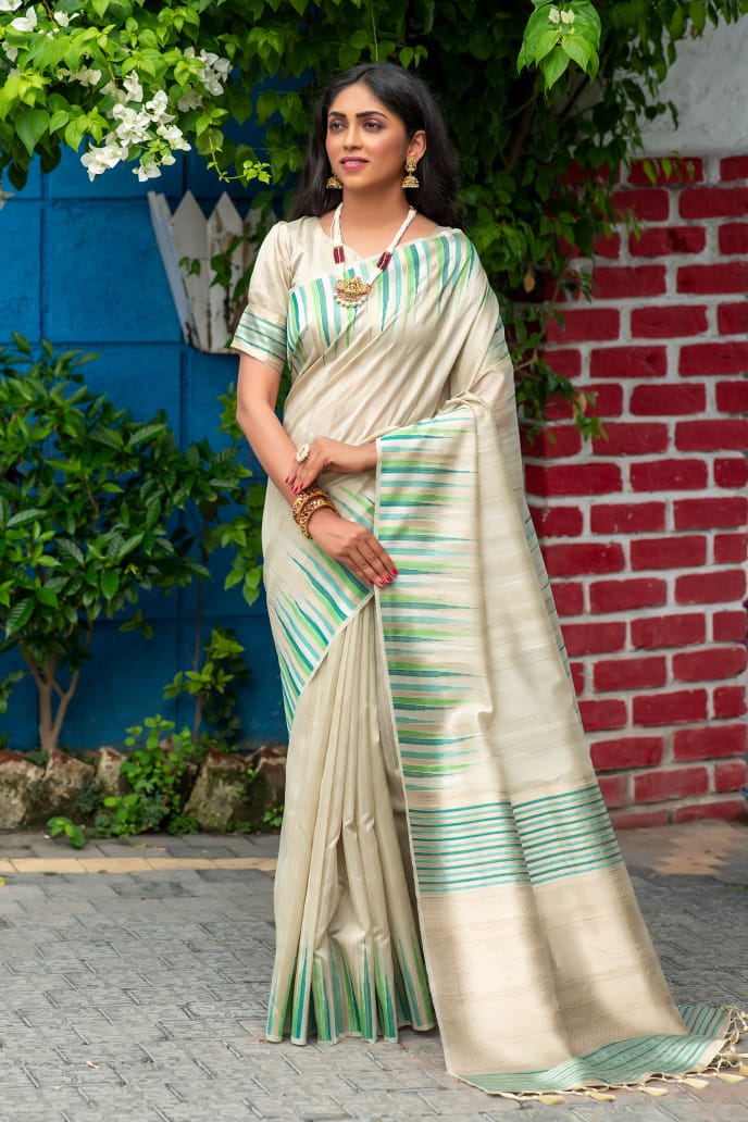 Light Grey Tussar Silk weaving saree with Ikkat woven Border