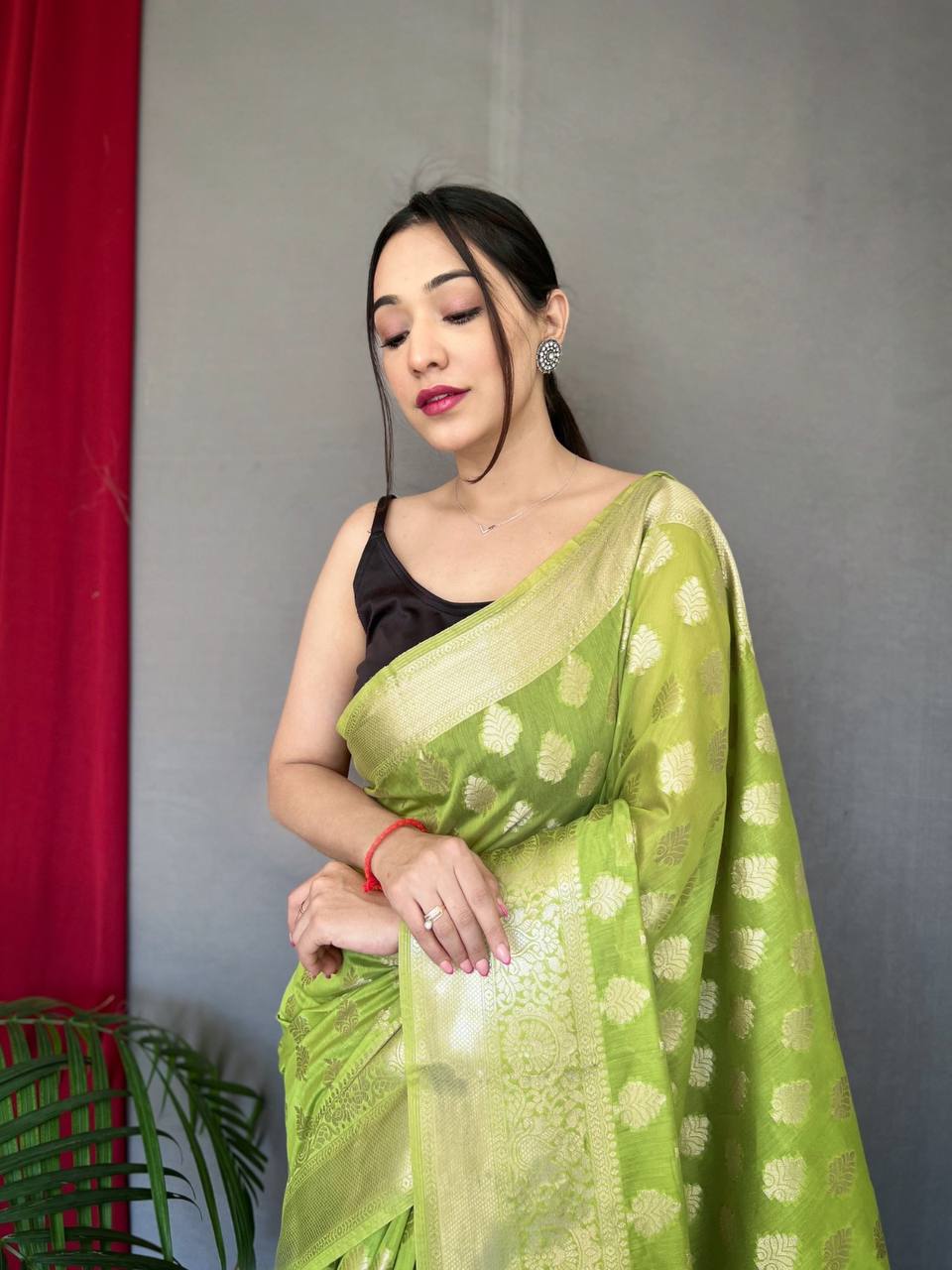 Green Muslin  Silk Saree With Rose Gold Zari Weaved