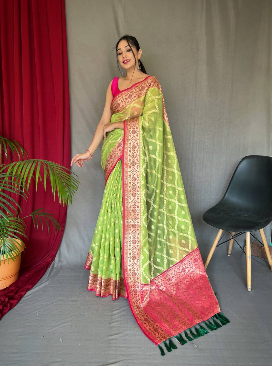 Green Pure organza weaved saree with Jacquard border.