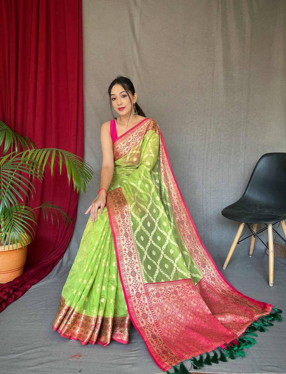 Green Pure organza weaved saree with Jacquard border.