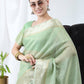 See Green Tissue Linnen Silk Saree With Fancy Zari Weaving Border